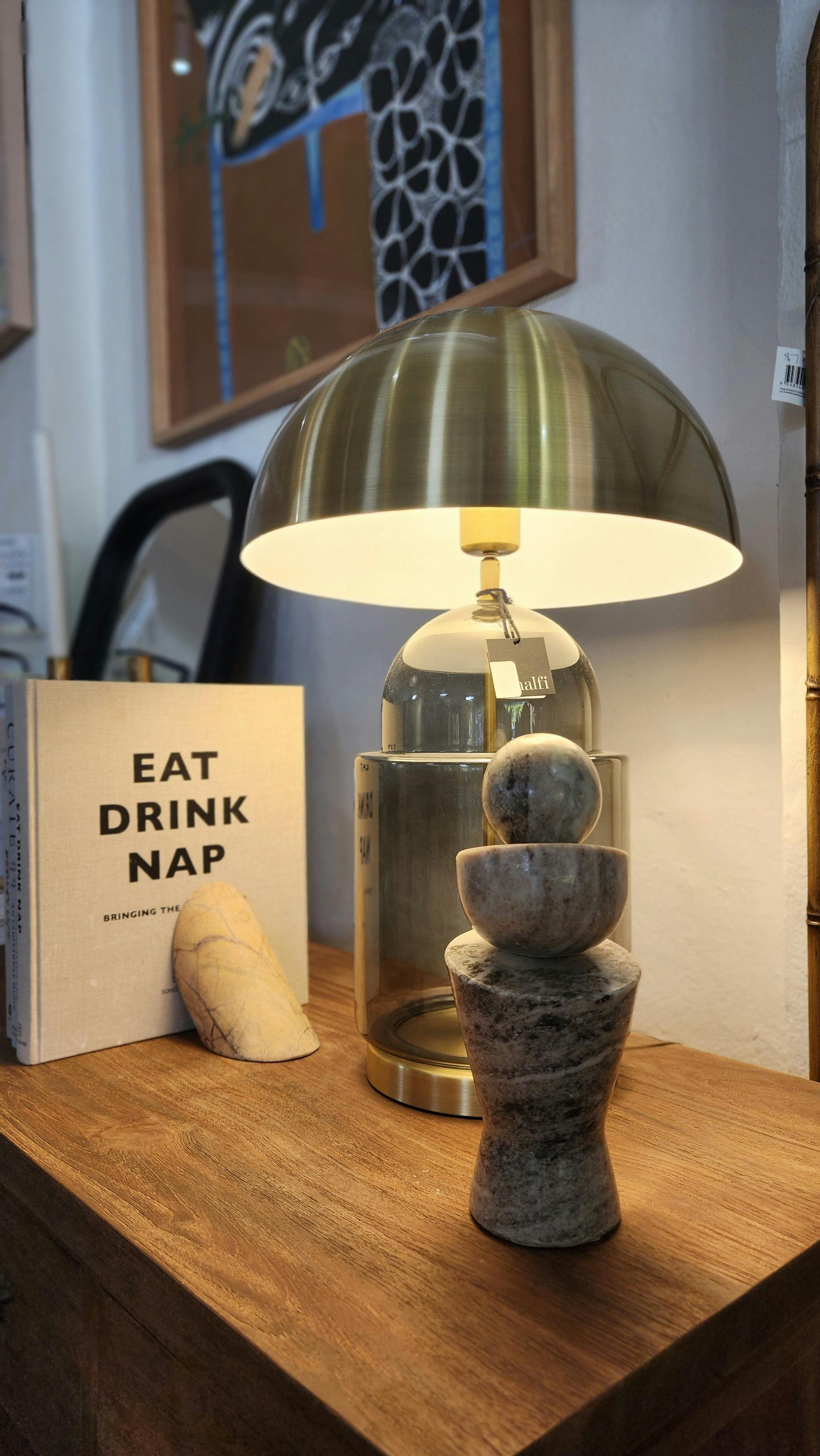 Eat Drink Nap book, with ceramic display and lamp