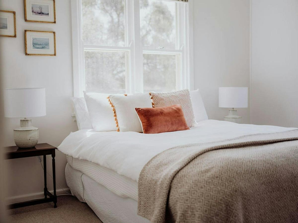 Crisp white lined and a north facing master bedroom