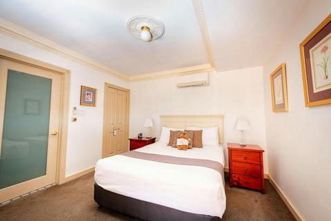 Junior Queen Room with Shower Only