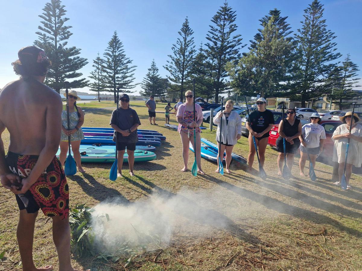 Sam from Gumaraa and a smoking ceremony