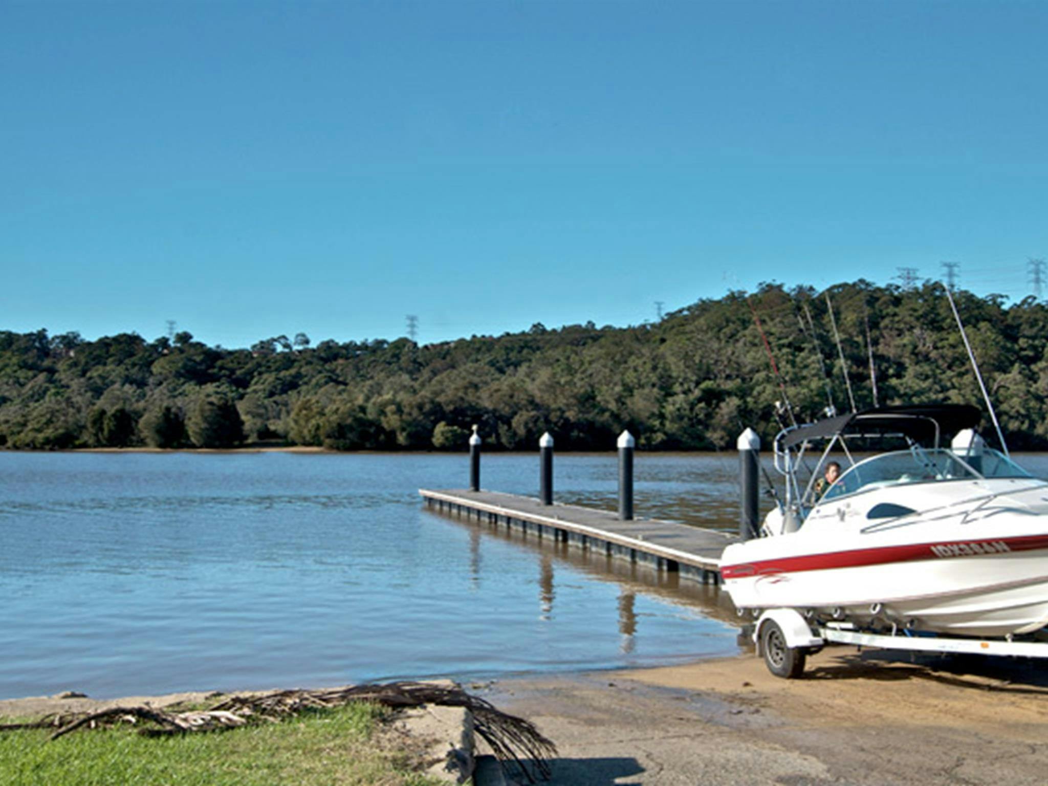 Boat and jetty in Georges River National Park. Photo: John Spencer