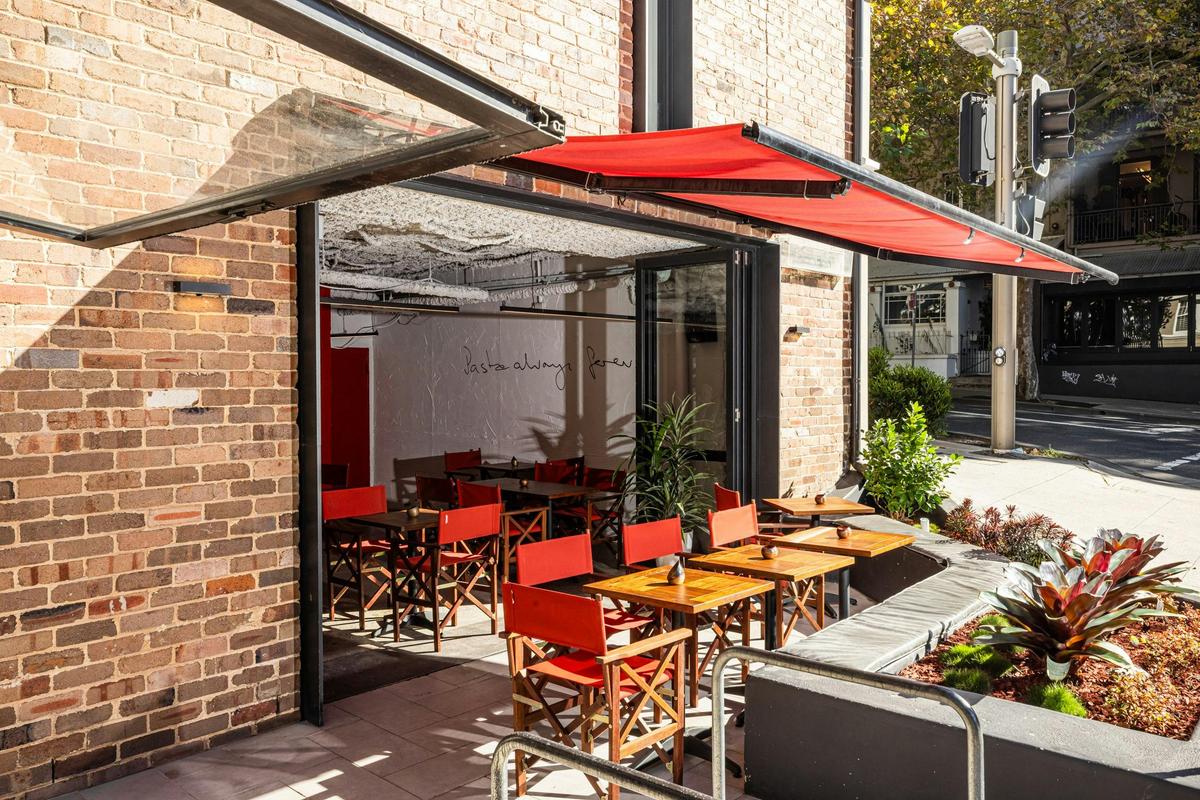 Pasta Shop red awning outdoors