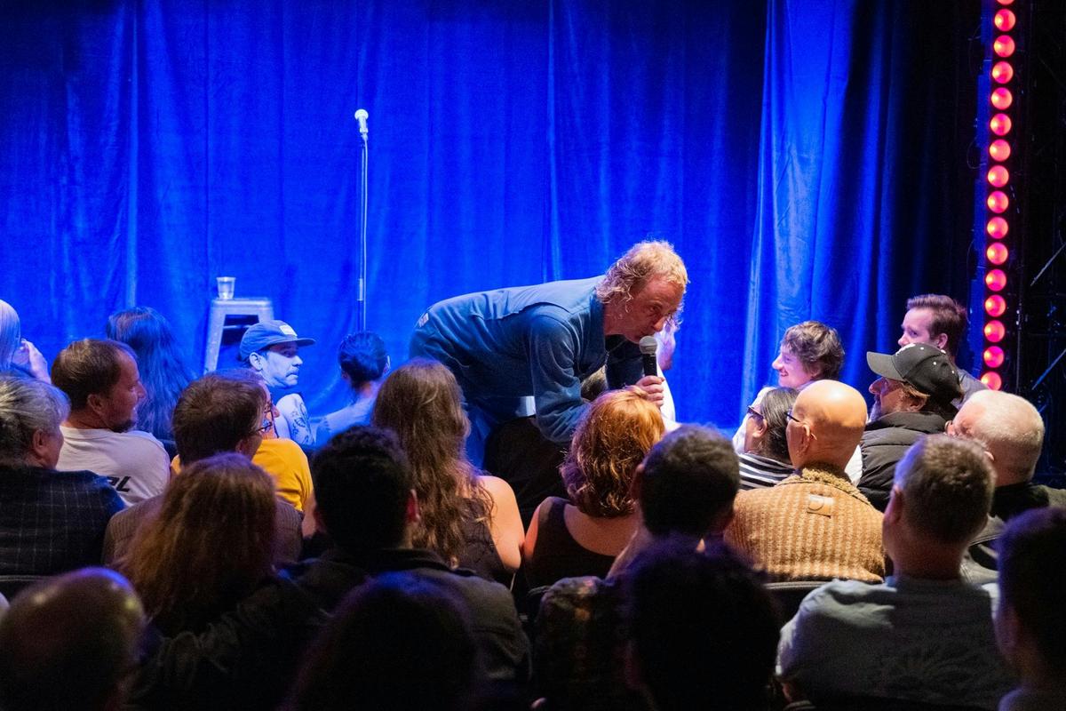 Live stand-up comedy performance at Comedy Store in Sydney.