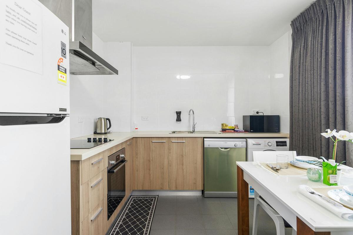 Kitchen & Laundry in Self-Contained Studio Apartment