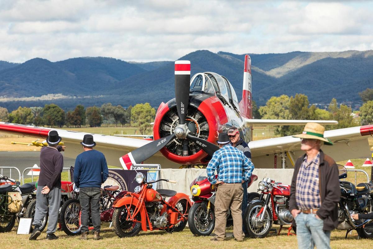 Warbirds and motorcycles on display