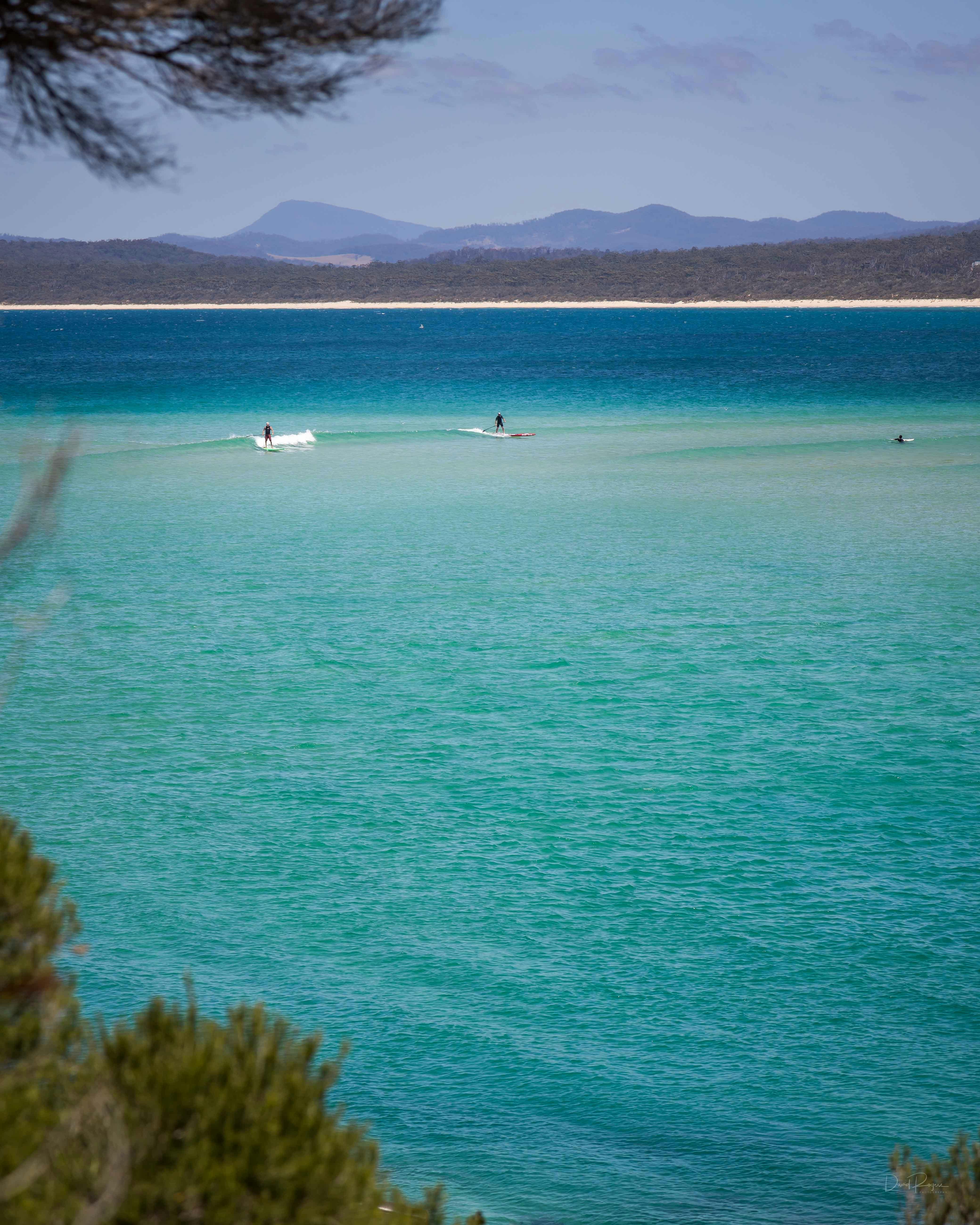Surfing Merimbula Bar Beach