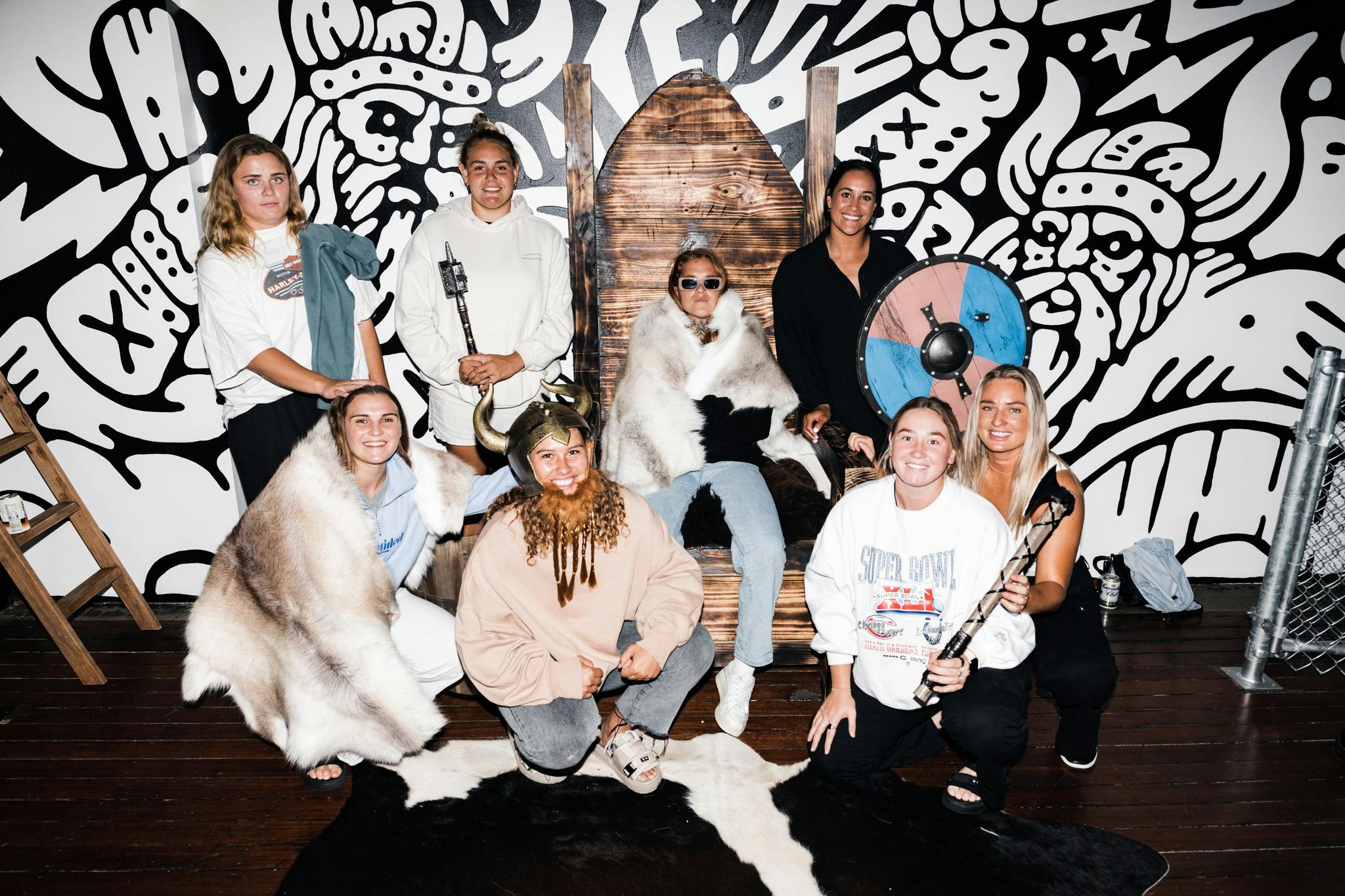 Group of people posing around our Viking throne