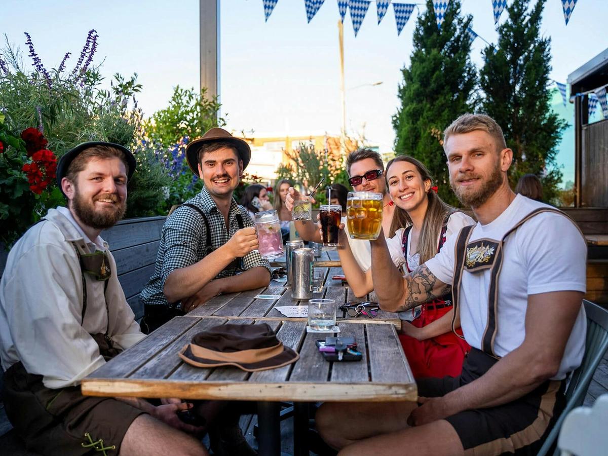 Table full of smiles, bellies full of beer