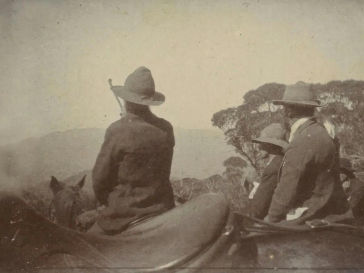Johnney Riley pointing out 'The Pilot' ascending Kosciuszko