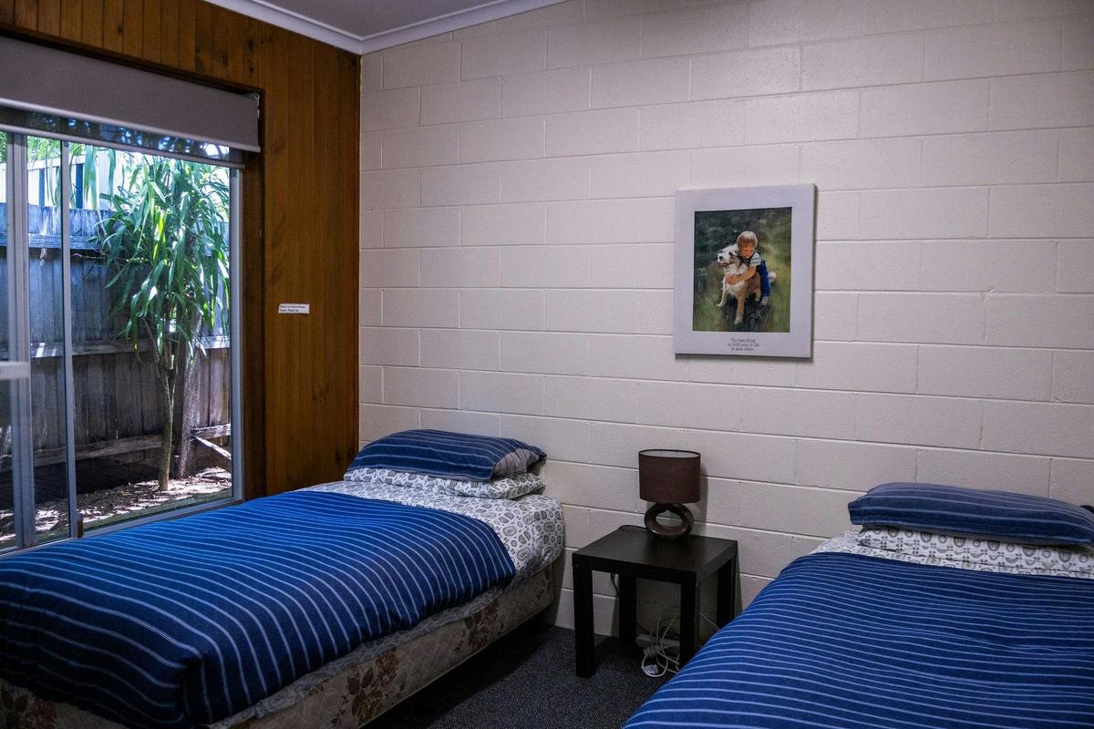 Second bedroom with single beds — comfortable for families or groups.
