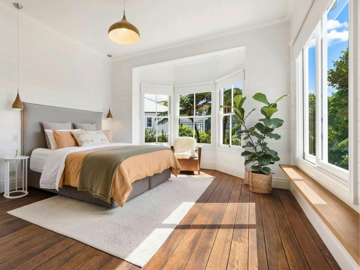Light filled bedroom with garden outlook.