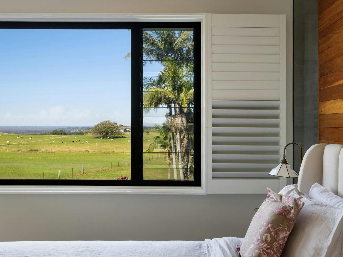 Bedroom with peaceful rural views.