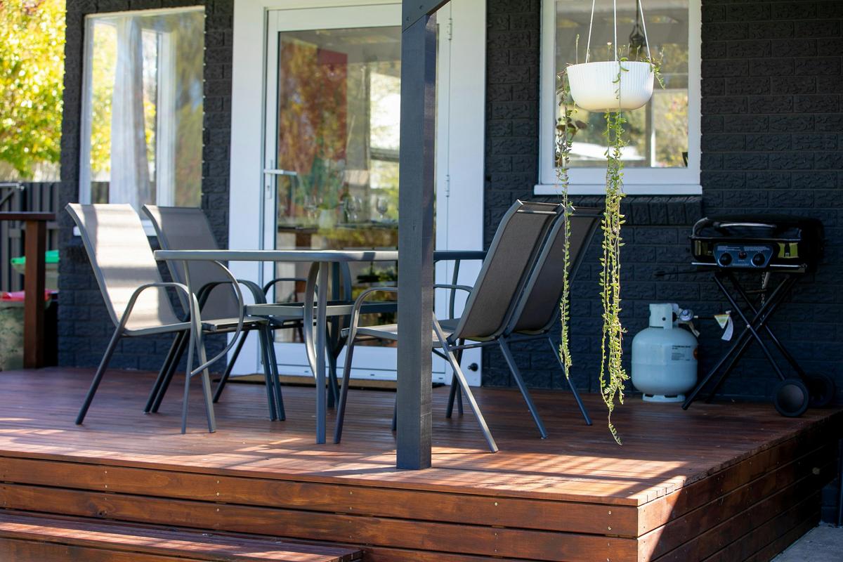 Relax on the back deck overlooking the garden
