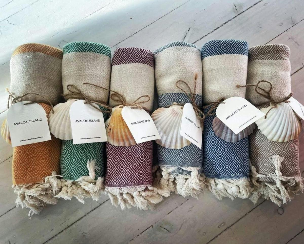 Market Stall beach towels in assorted colours at the Nest Markets