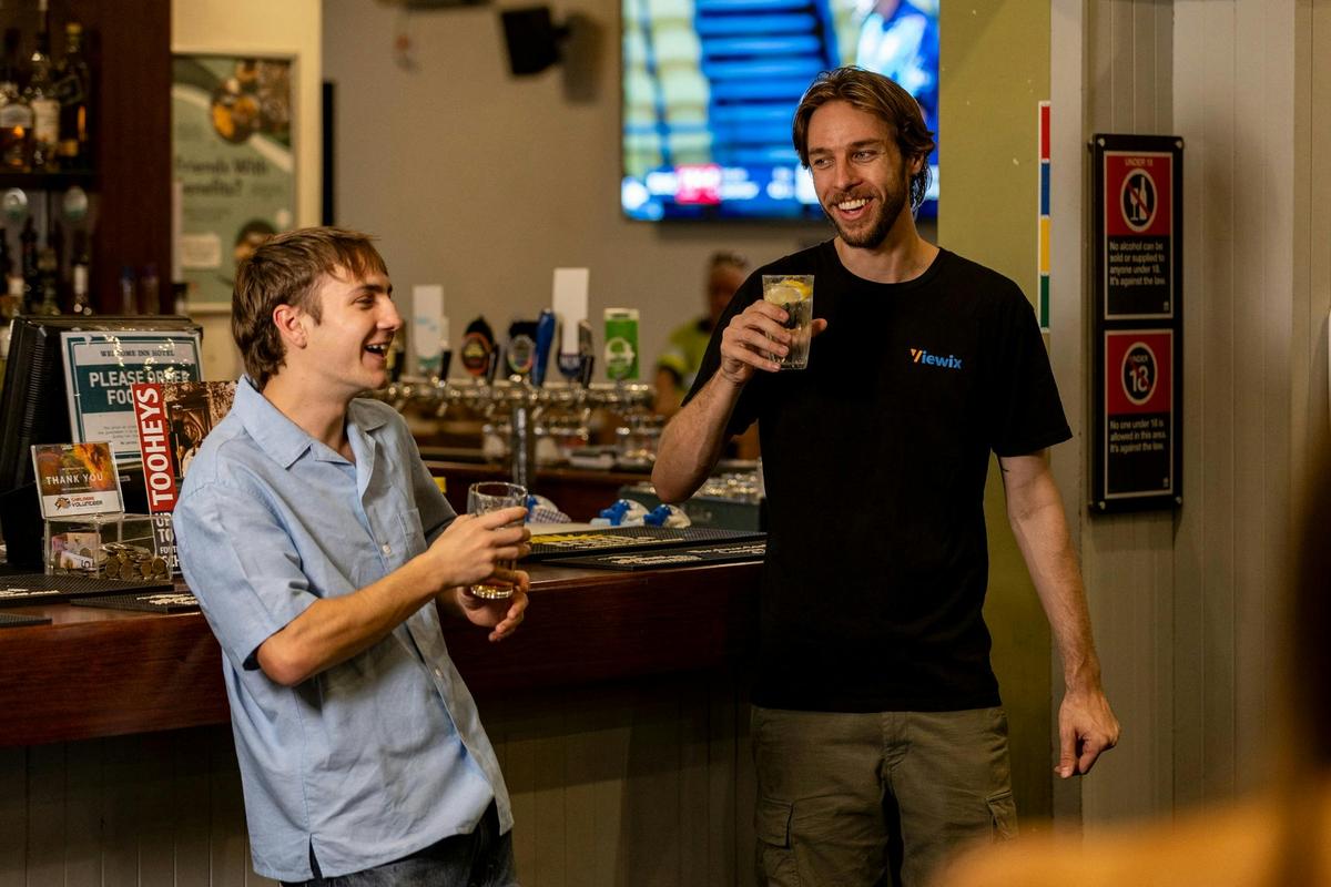 Friends enjoying a beer at the Welcome Inn Hotel