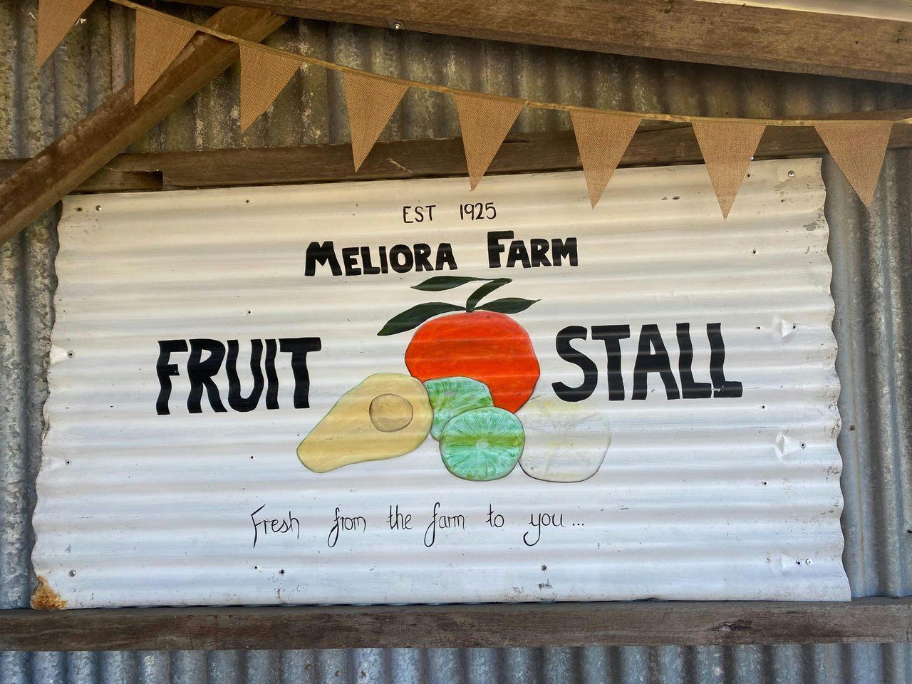 Meliora Farm welcome sign