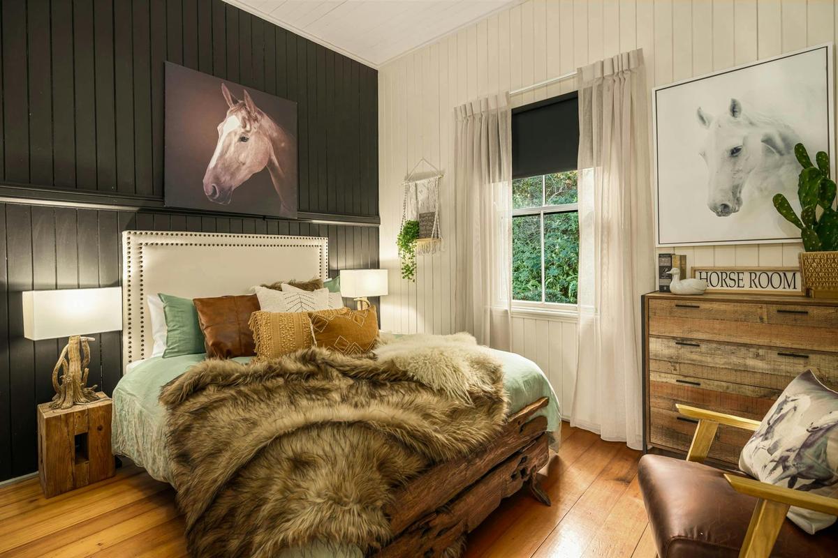 Eclectic bedroom 3 has a queen bed