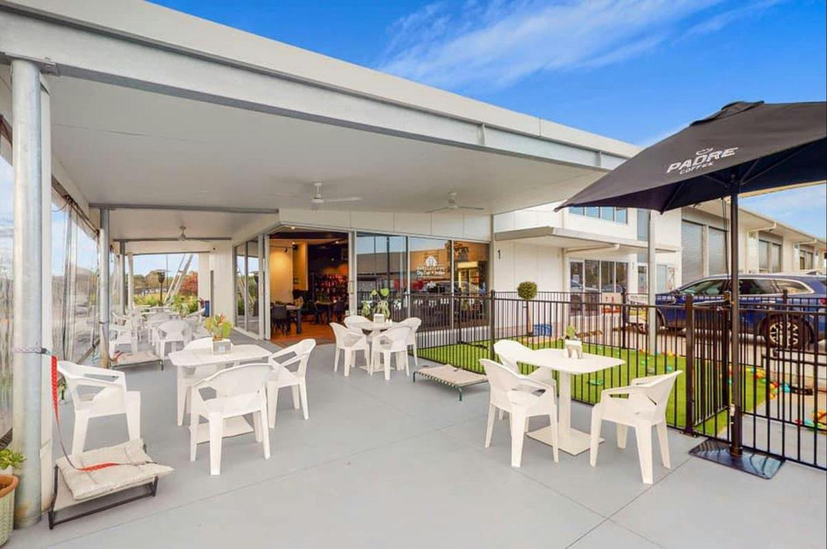 Outside dining area and puppy playpen