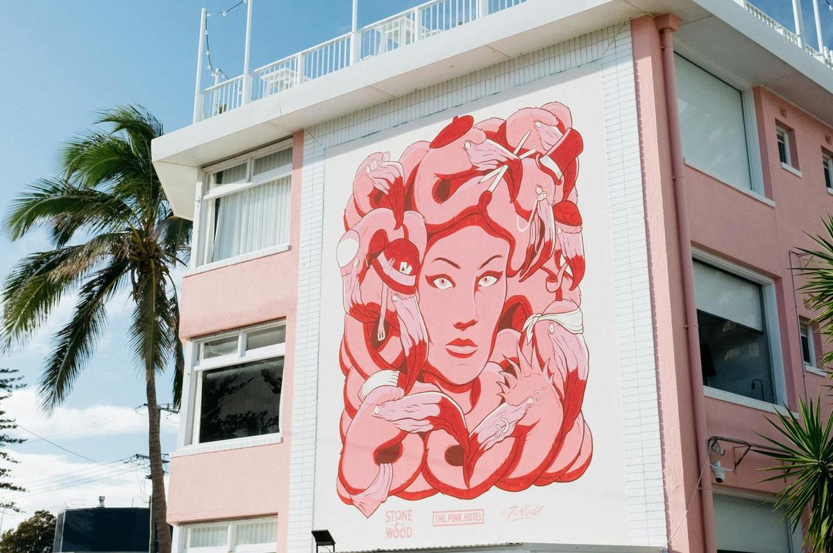 Pink Hotel mural by Poon Goat