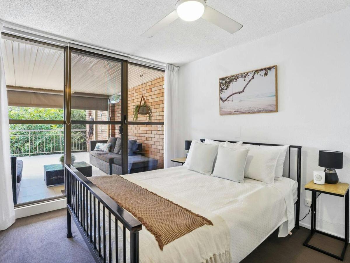 Main double bedroom with walk-in wardrobe and main balcony access