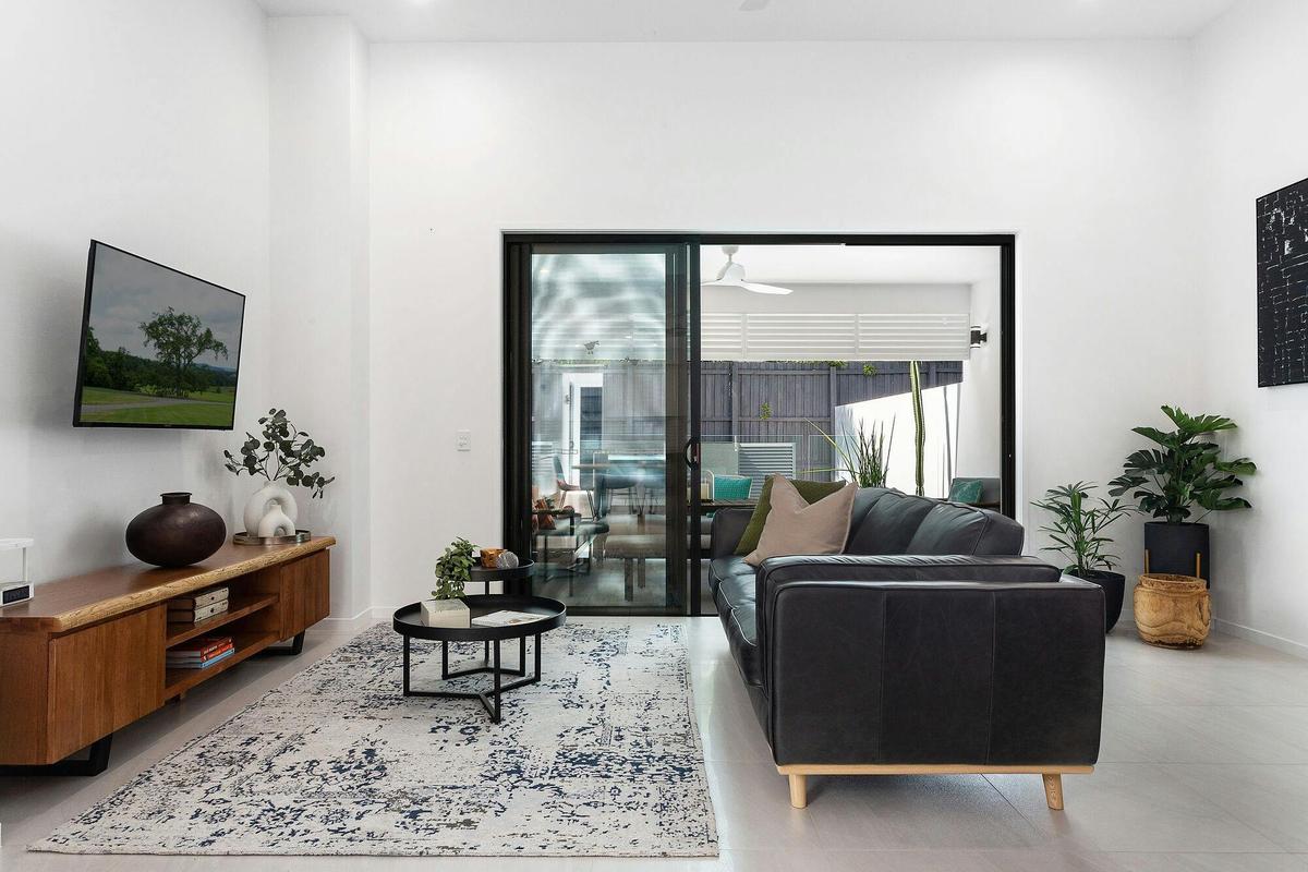The lounge area flows out to covered outdoor living
