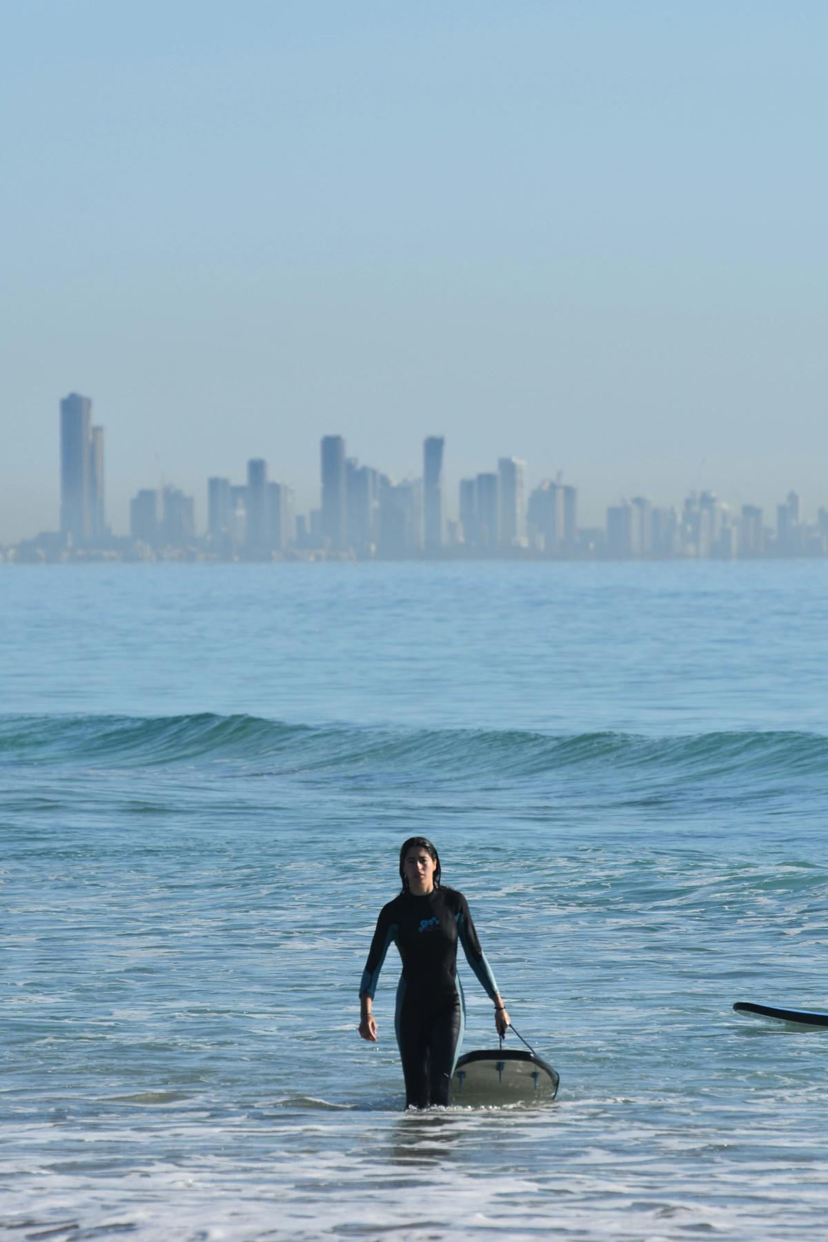 Learn to surf against the iconic Gold Coast skyline with Australian Surfing Adventures.