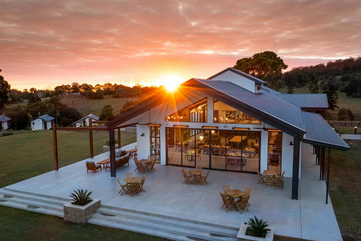 Exterior photo of The Club House including The Paddock restaurant, Hazelwood Estate at sunset