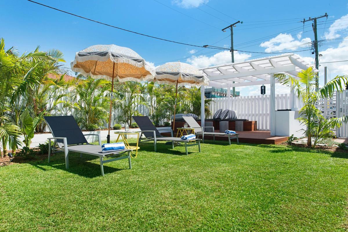Tropical Garden and Entertaining Area with barbecue