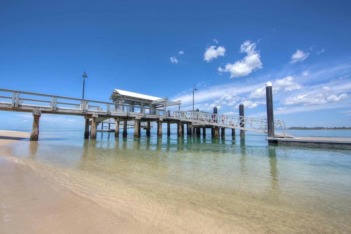 Crystal clear water surrounding the Bongaree Jetty