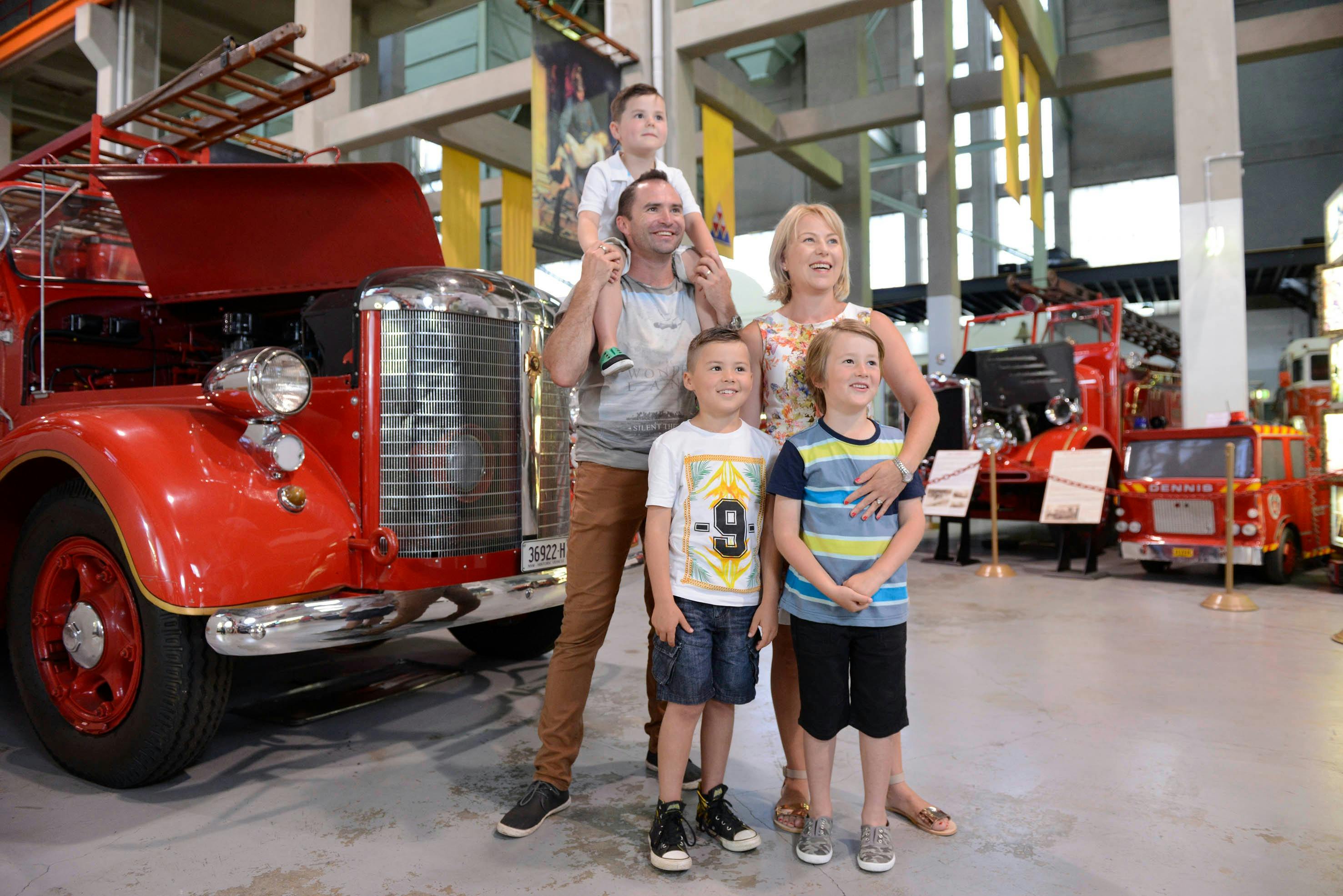 Family standing in the Museum of Fire