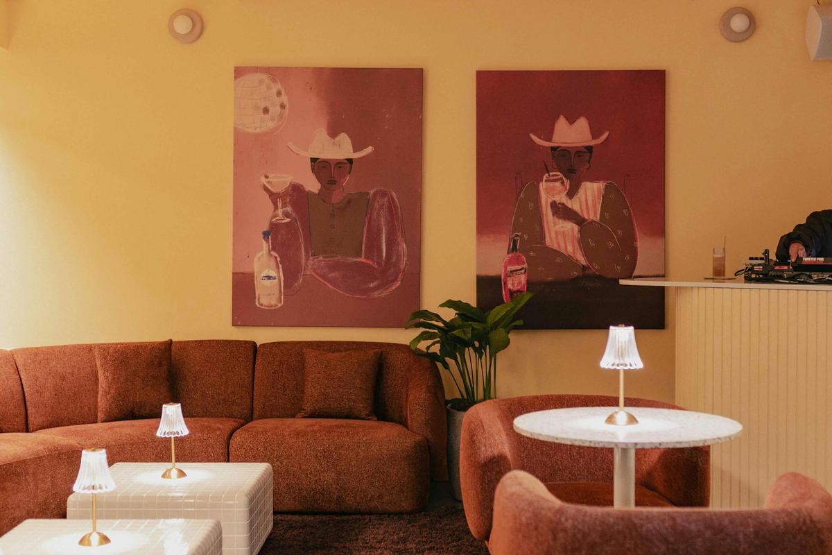 low lighting, red chairs