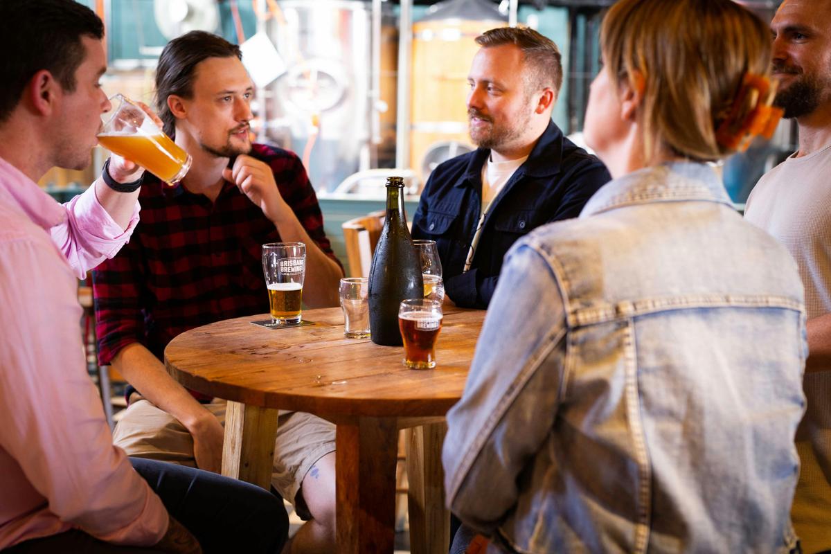 Customers chatting over a beer
