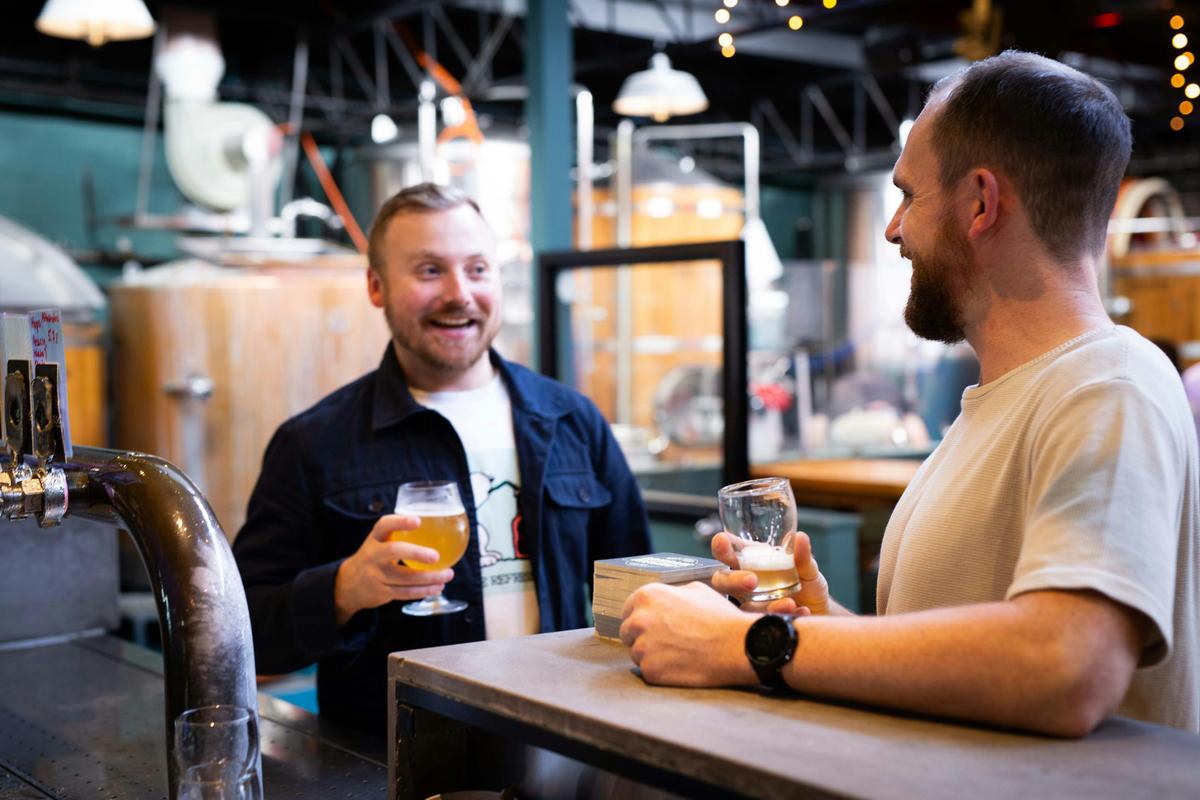 Customer s enjoying a beer