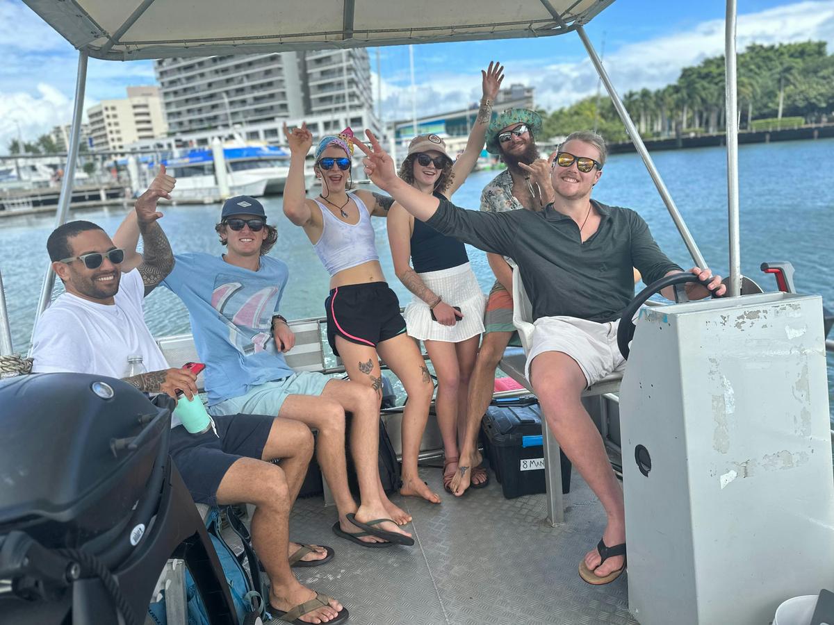Group of friends heading out for a day on the Trinity Inlet with BBQ Hire and drinks