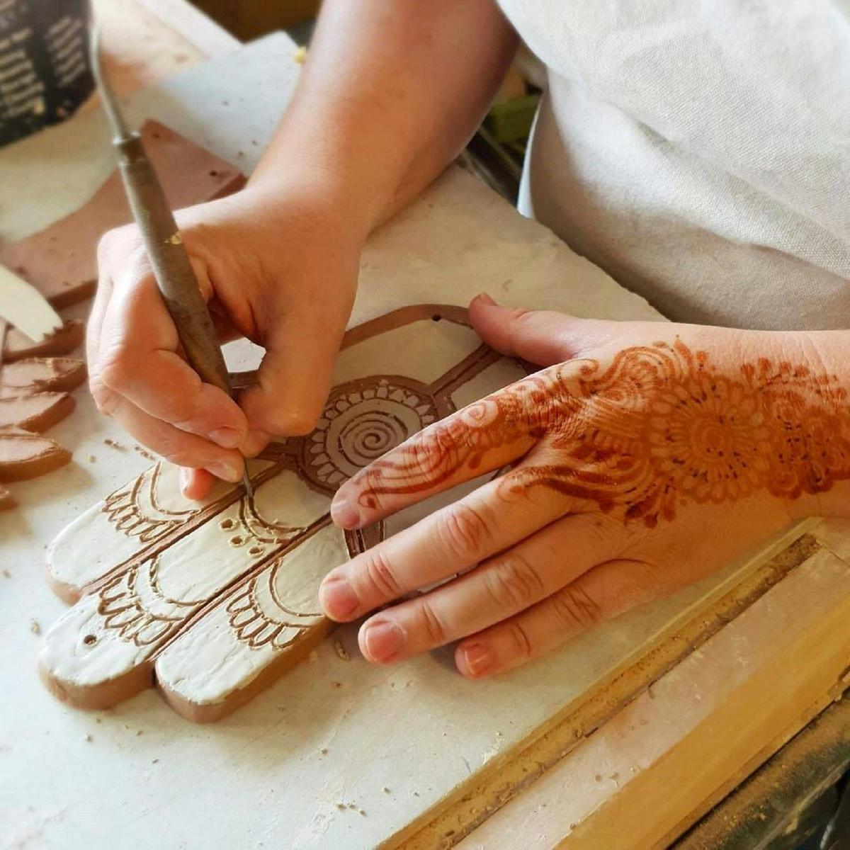 Hamsa hand carving
