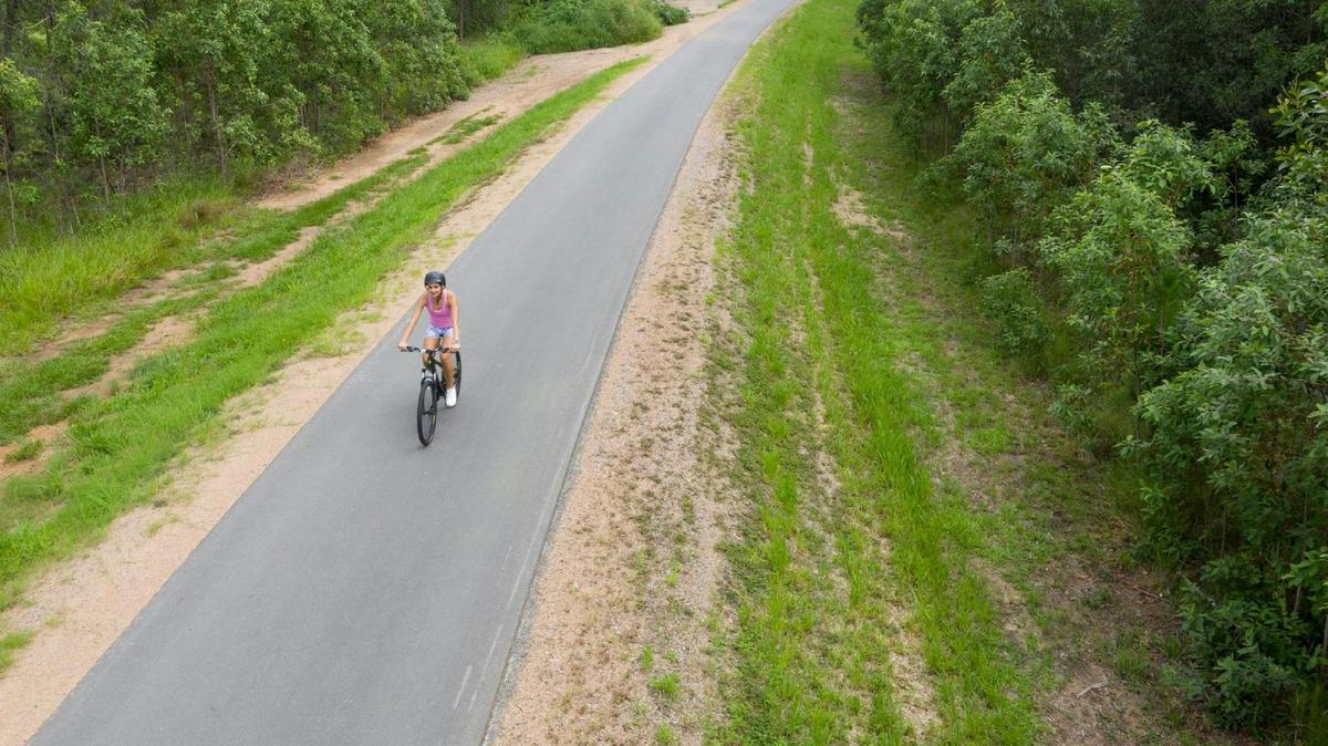 Cycling along the Caboolture to Wamuran Rail Trail