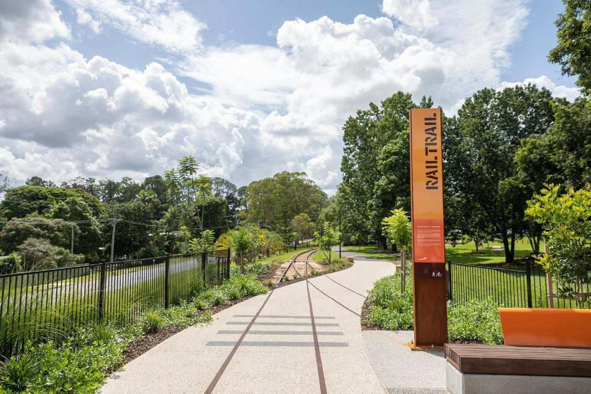 The Caboolture to Wamuran Rail Trail offers wide pathways perfect for family outings