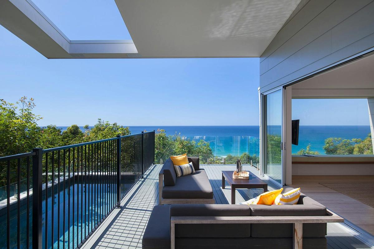 Elevated balcony with ocean views, lap pool and BBQ