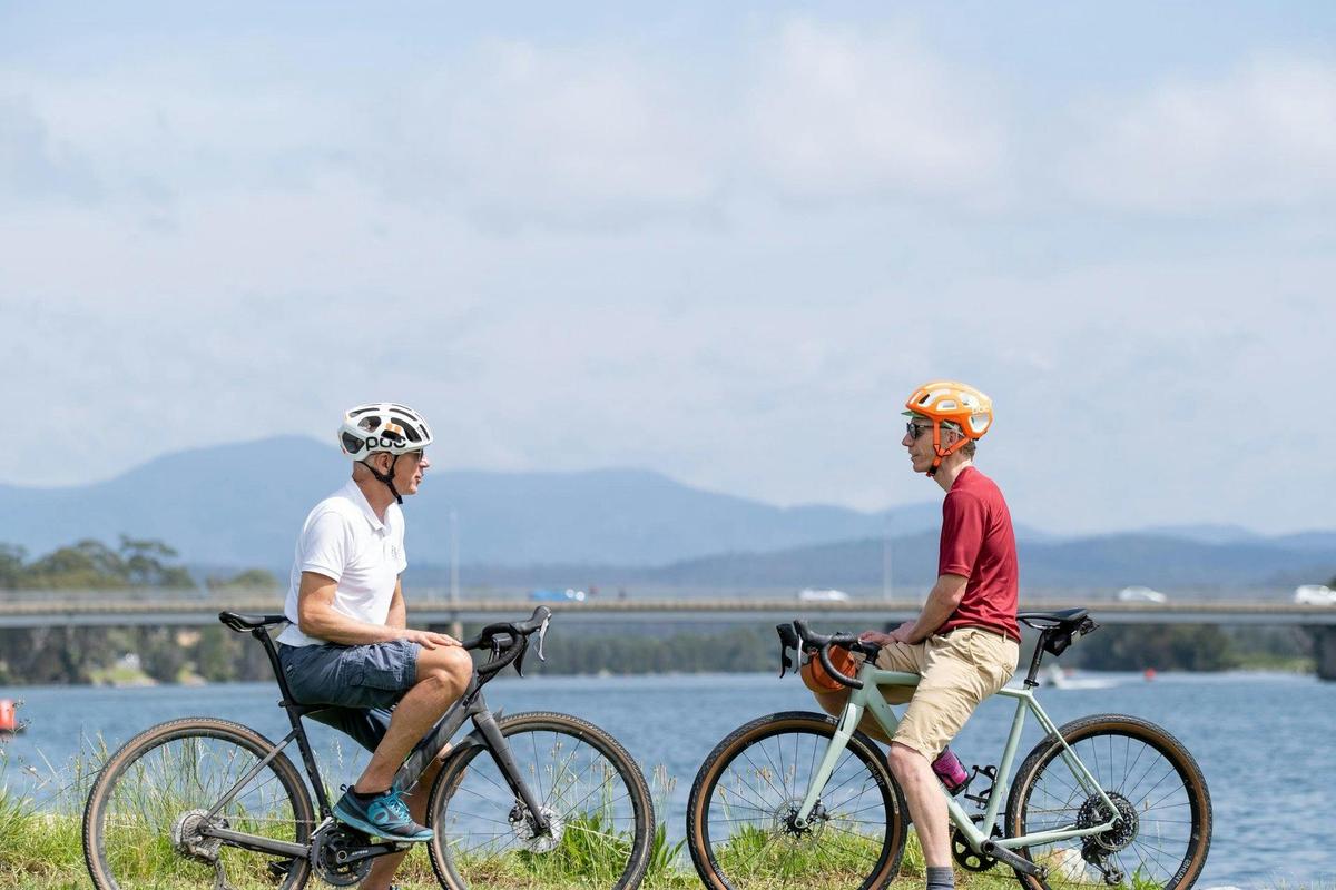 Cyclists by the Moruya River