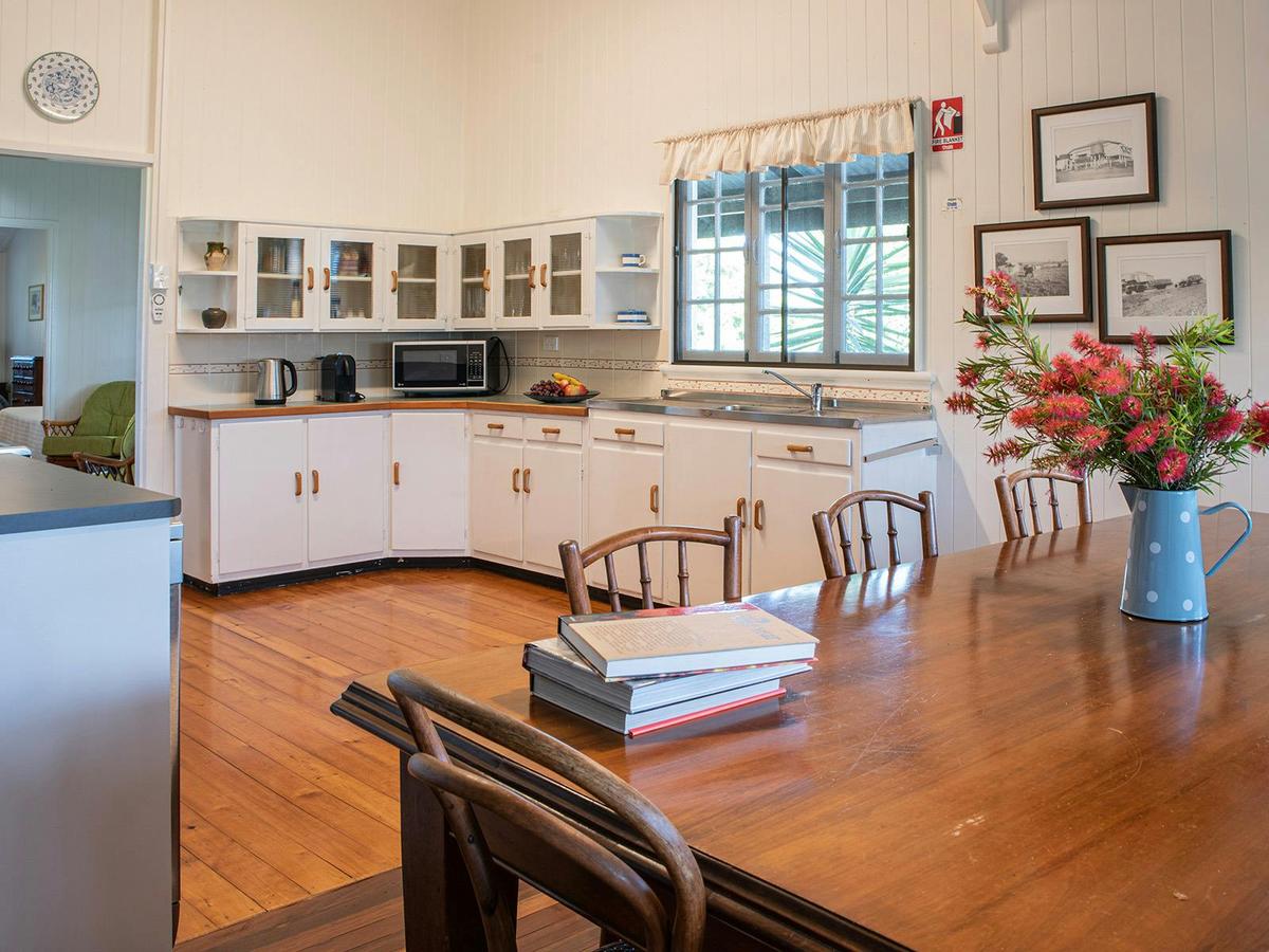 Family dining in cottage kitchen