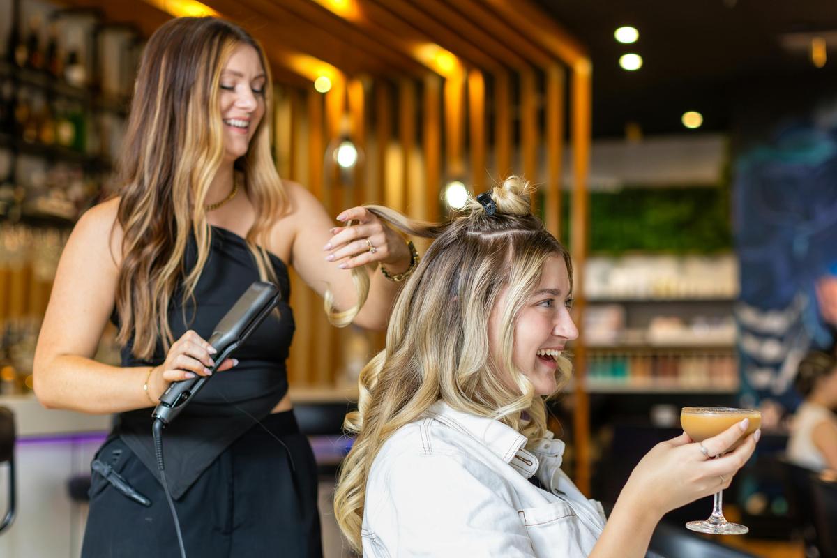 Get pampered with a fresh cut while sipping on a cocktail at Circle on Cavill!