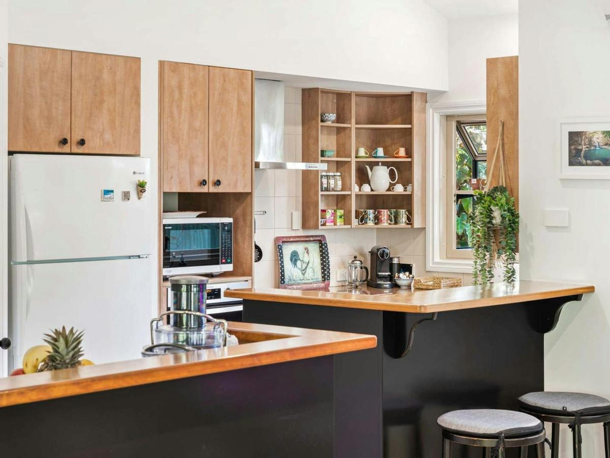 Prepare fresh meals or juices in the villa’s modern, fully stocked kitchen space.