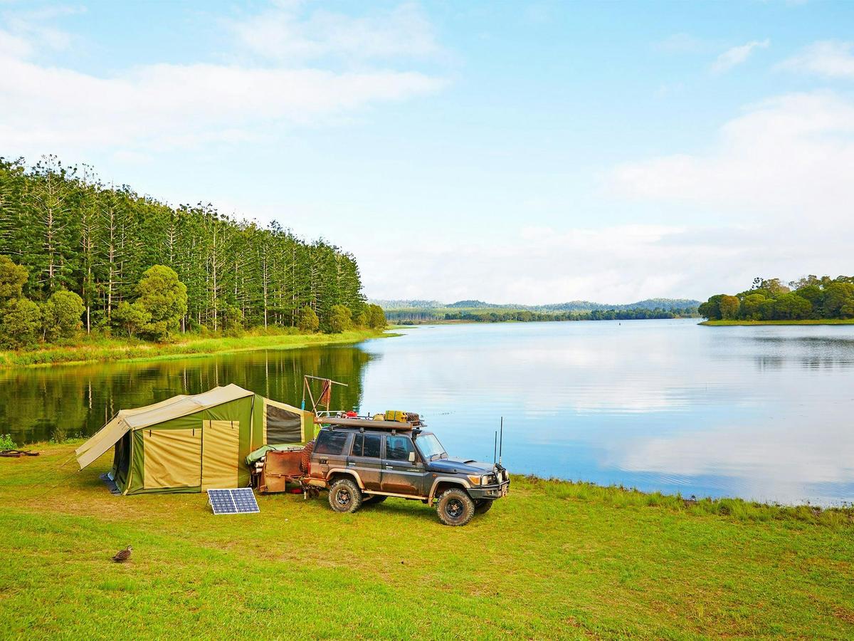 Pitch your tent on the banks of Lake Tinaroo at Kauri Creek camping area.