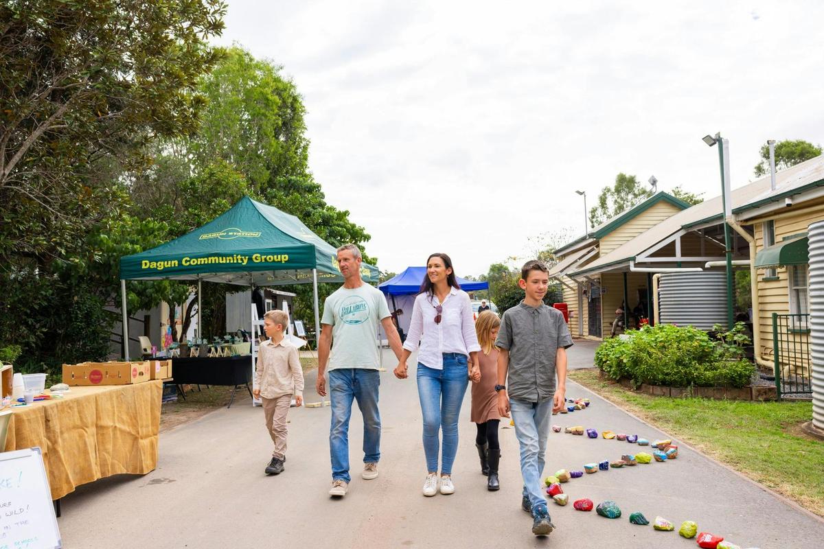 Family walking through the Dagun Markets