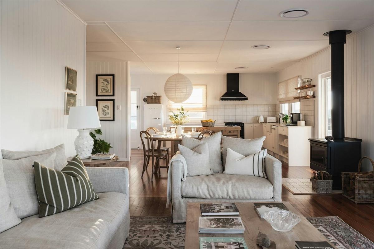 The open plan kitchen, dining and living area. With views from every window.