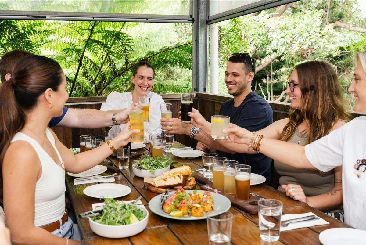 Group enjoying local produce and craft beers