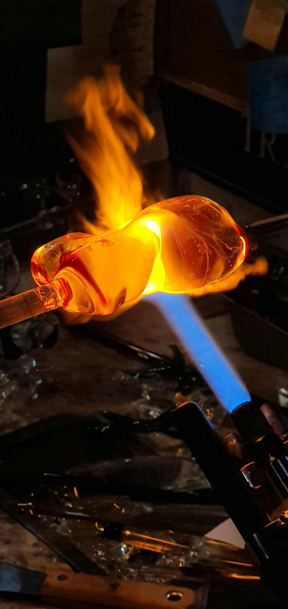 Watch as one of our glass artists works the glass into a piece of art using a 2220'C flame