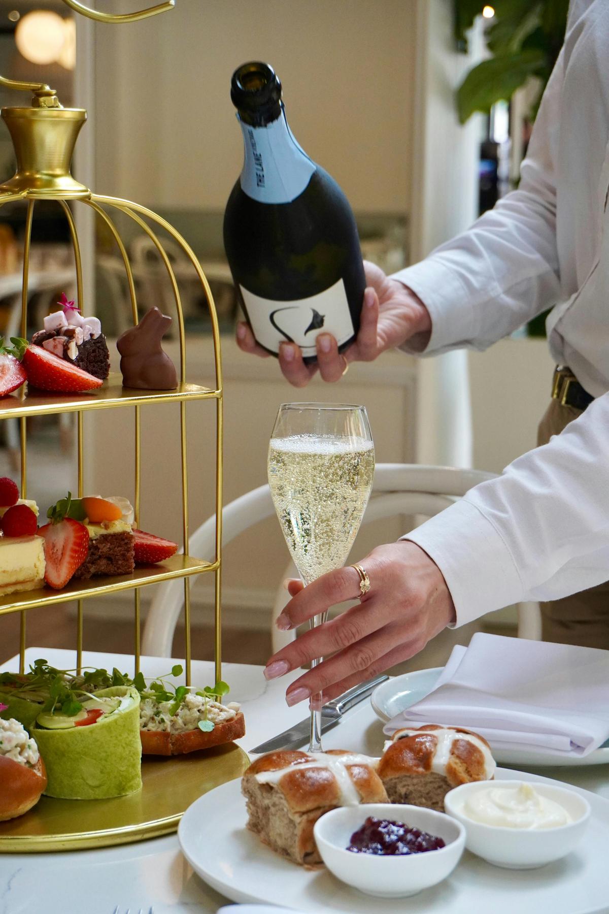 Pouring champage into wine glass