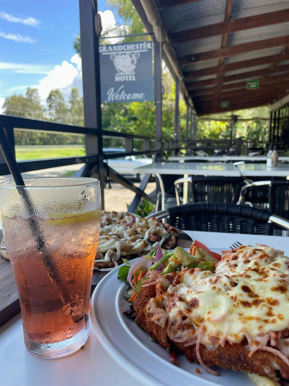 Chicken schnitzel, pizza and drink