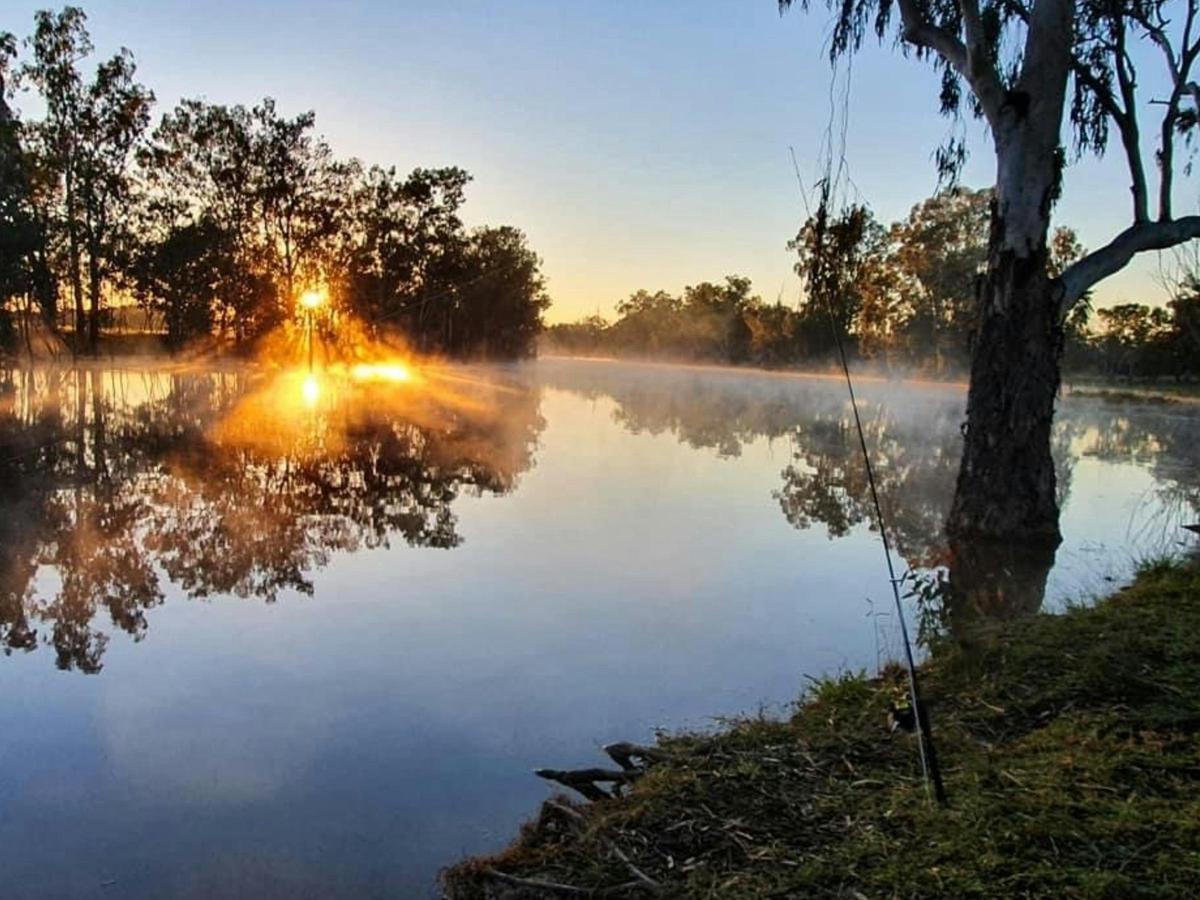 Sunrise over the creek while camping at Greenup Meeting Place